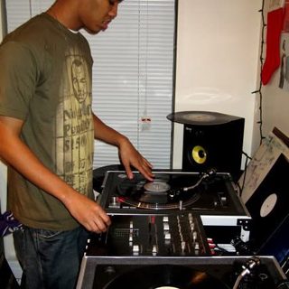 Young deejaypryme practicing on Technics turntables at home in 2006